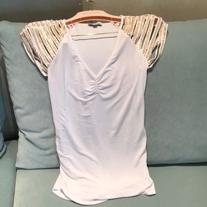 Bebe white top with gold crystal sleeves